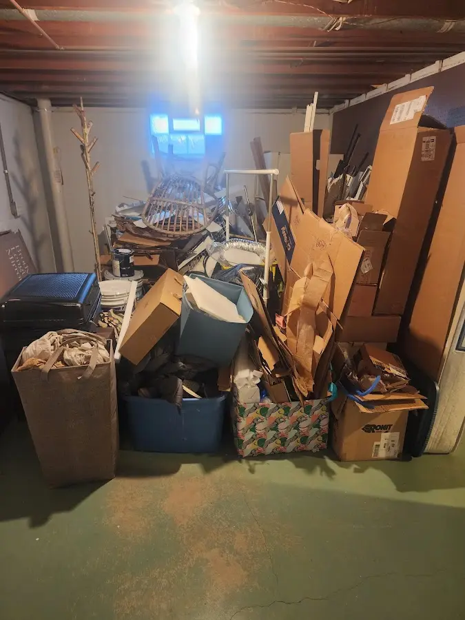 Roll-off dumpster container at job site for 15 Yard Dumpster Rental in Hampstead